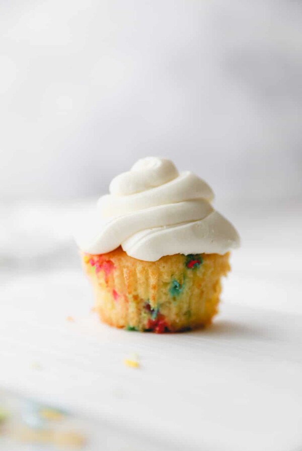 one funfetti cupcake with vanilla buttercream.