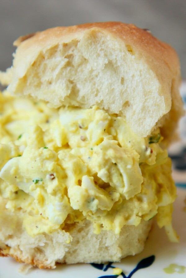 egg salad sandwich on a small plate