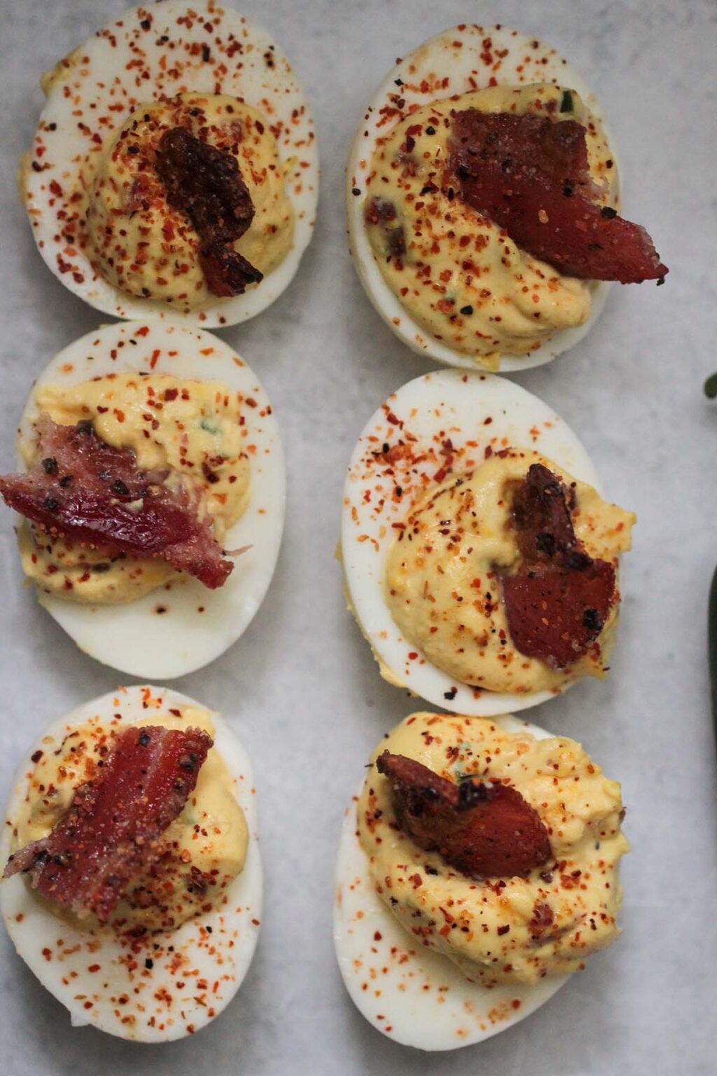 Candied Bacon Jalapeno Deviled Eggs - Cooked by Julie