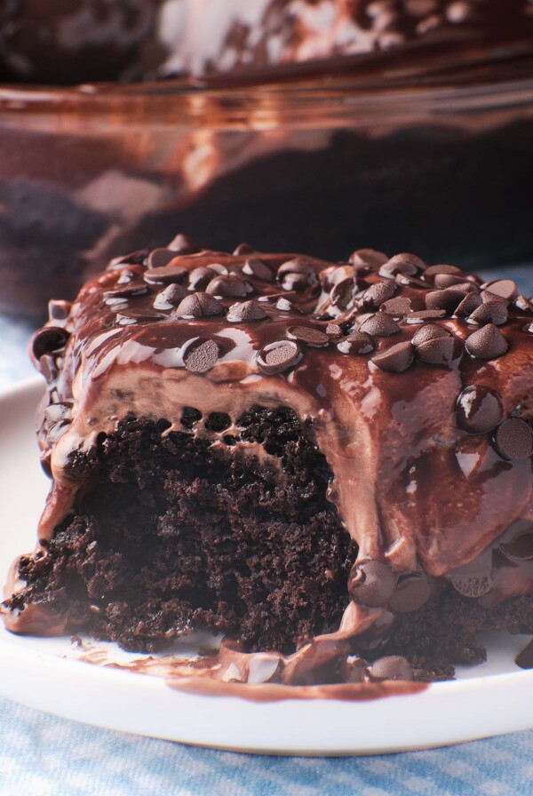 a slice of chocolate poke cake up close.