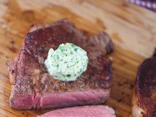 https://www.cookedbyjulie.com/wp-content/uploads/2022/05/garlic-herb-compound-butter-on-steak-500x375.jpg