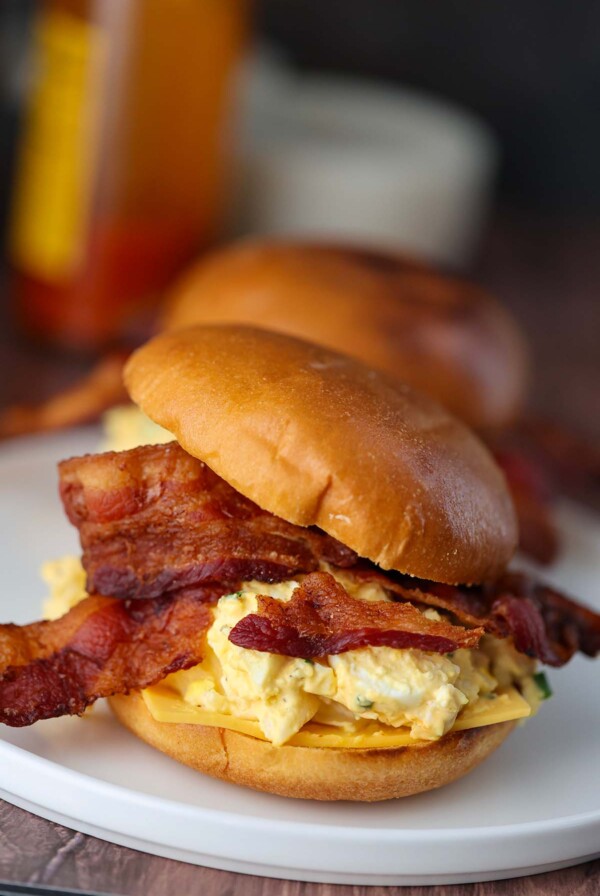 egg salad sandwich with bacon and cheese.