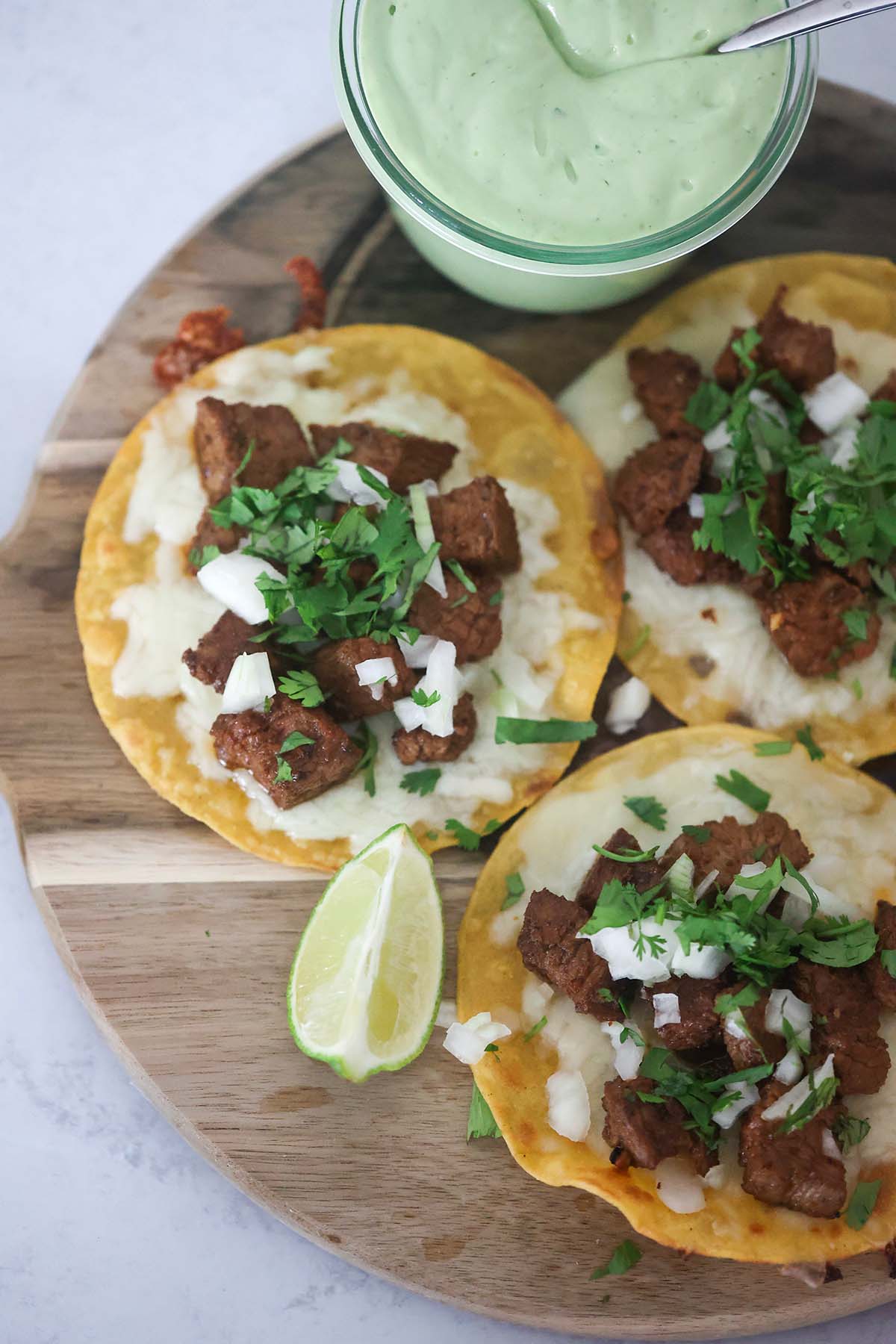 tacos on a wooden board. 